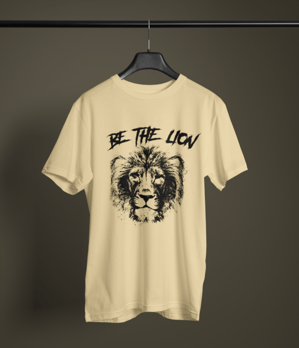 beige color be the lion graphic tee on a hanger