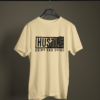beige color hustle grind and shine graphic printed t-shirt on a hanger