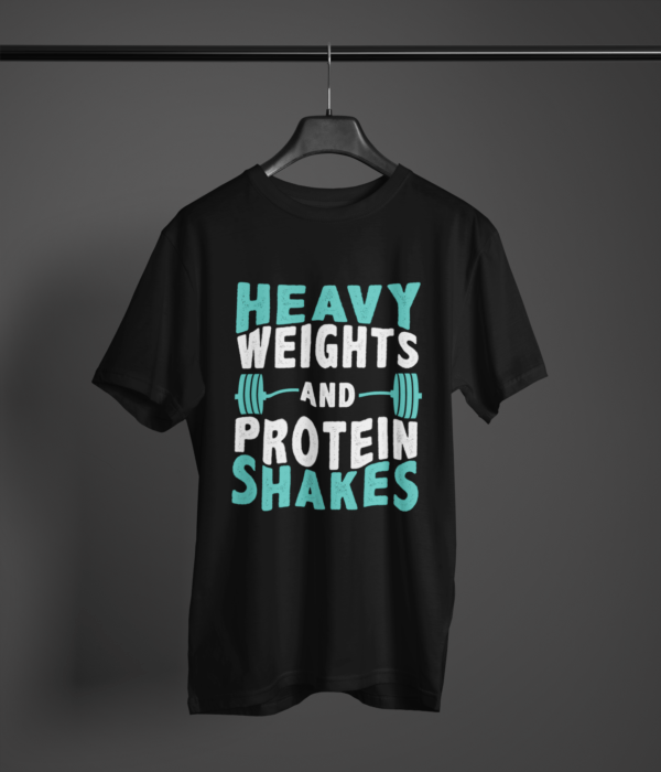 black color heavy weights and protein shakes graphic tee on a hanger