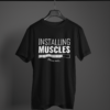 black color installing muscles printed tee on a hanger