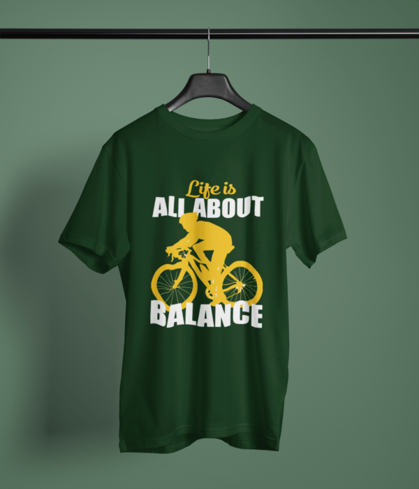 bottle-green-life-is-all-about-balance printed t-shirt on-a-hanger