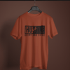 brick red color hustle grind and shine graphic printed t-shirt on a hanger