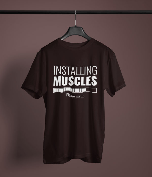 coffee brown color installing muscles printed tee on a hanger