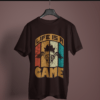 coffee brown color life is a game graphic tee on a hanger