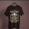 coffee brown color i'm a mechanic graphic t-shirt on a hanger