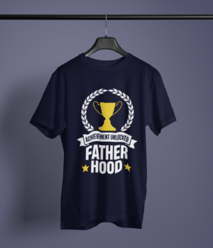 navy-blue-achievement-unlocked-father-hood graphic tee on-a-hanger