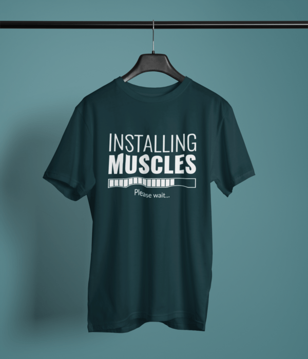 petrol blue color installing muscles printed tee on a hanger