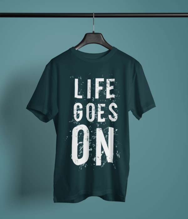 petrol blue color life goes on printed tee on a hanger