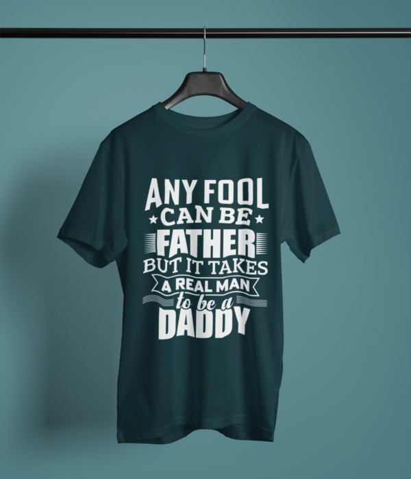 petrol-blue-it-takes-real-man-to-be-a-daddy printed t-shirt on-a-hanger