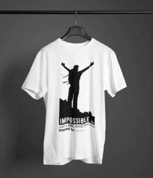 white color impossible is just a big word thrown by small men graphic printed t-shirt on a hanger